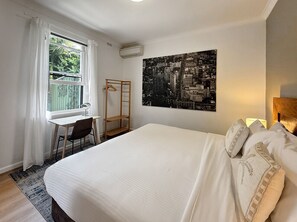1 bedroom, desk, iron/ironing board, travel cot