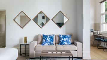 1 bedroom, desk, iron/ironing board, travel crib