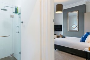 1 bedroom, desk, iron/ironing board, travel crib