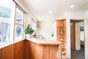 Fridge, coffee/tea maker, cookware/dishes/utensils