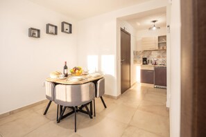 A modern kitchen with a dining area. - Harmony House Vito With Lovely Terrace, Lopar, Croatia (Lopar)
