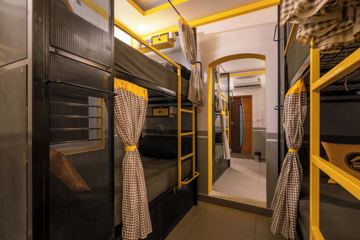 Dormitorio compartido básico | Wifi gratis y ropa de cama