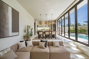 Villa Luxe, vue piscine | Salle de séjour