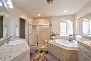 Shower, hair dryer, towels, shampoo