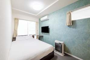 1 chambre, fer et planche à repasser, Wi-Fi gratuit, draps fournis