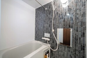 Hair dryer, towels, shampoo