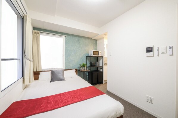 1 habitación, tabla de planchar con plancha, wifi gratis y ropa de cama 