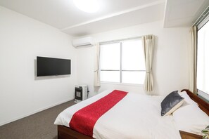 1 habitación, tabla de planchar con plancha, wifi gratis y ropa de cama 