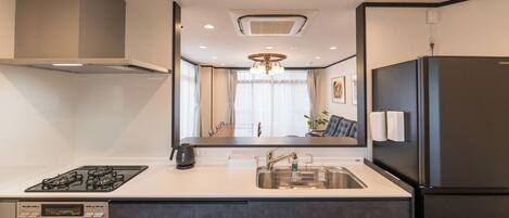 Fridge, microwave, cookware/dishes/utensils