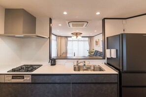 Fridge, microwave, cookware/dishes/utensils