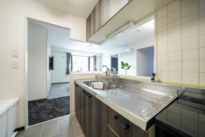 Fridge, microwave, cookware/dishes/utensils