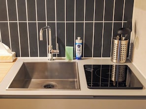 Fridge, microwave, stovetop, cookware/dishes/utensils