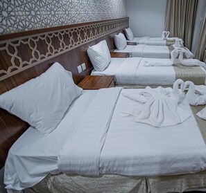 Quadruple Room | Soundproofing, bed sheets