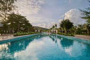 Outdoor pool, open 10:00 AM to 10:00 PM, free cabanas, pool umbrellas