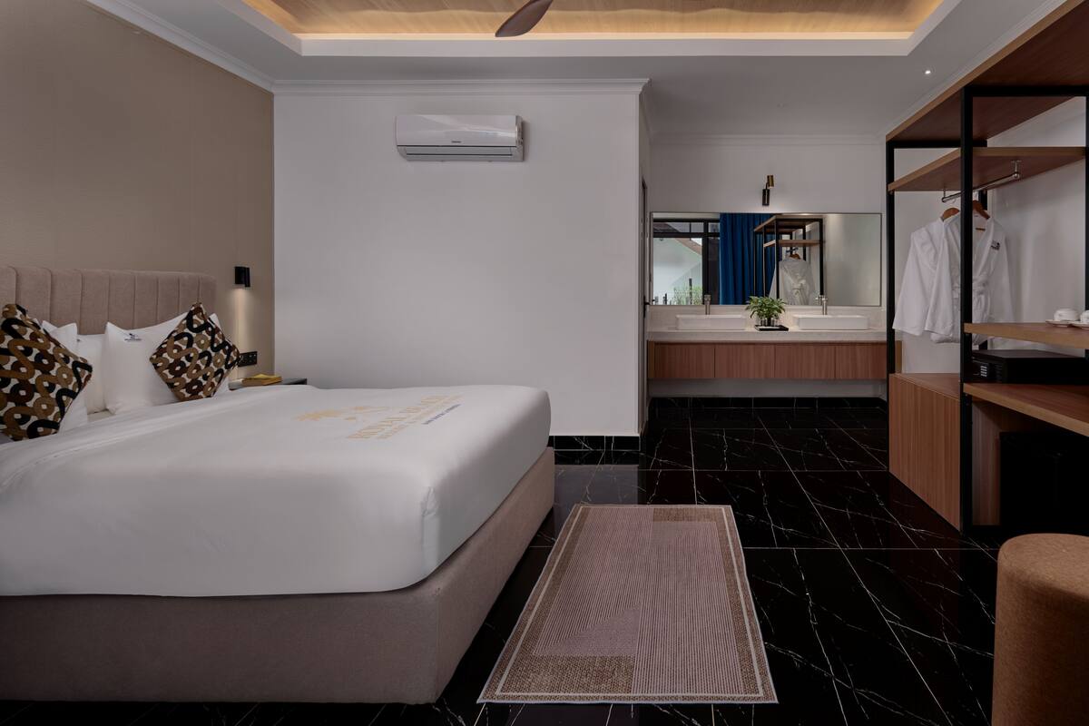 Ropa de cama de alta calidad y minibar 