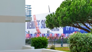 A building with a large banner reading "VENDÉE GL" and "10th Edition".