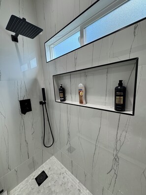 Shower, hair dryer, towels, soap
