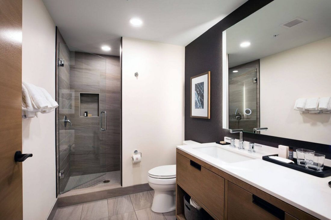 Bathtub, hair dryer, soap, shampoo