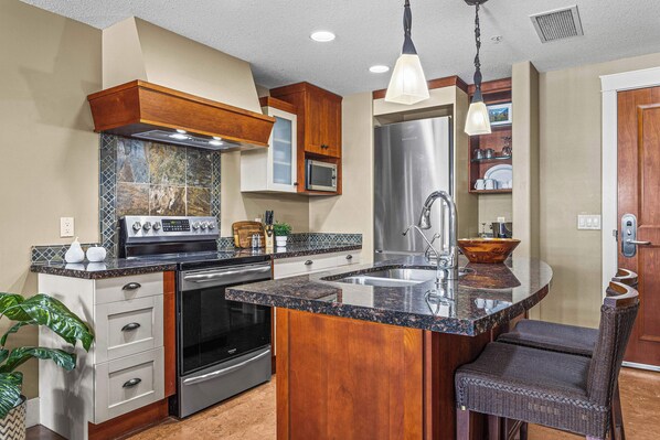 Family Condo, 2 Bedrooms, Balcony | Private kitchen | Coffee/tea maker, electric kettle