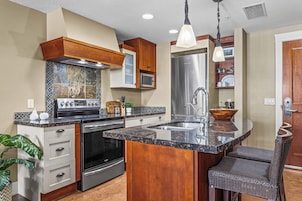 Family Condo, 2 Bedrooms, Balcony | Private kitchen | Coffee/tea maker, electric kettle