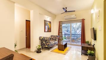 Family Studio | Living area | 32-inch LED TV with cable channels