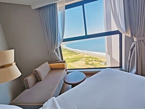 Habitación cuádruple, no fumadores, vistas a la playa | Vistas al mar