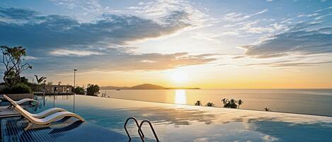 4 outdoor pools, pool umbrellas, sun loungers