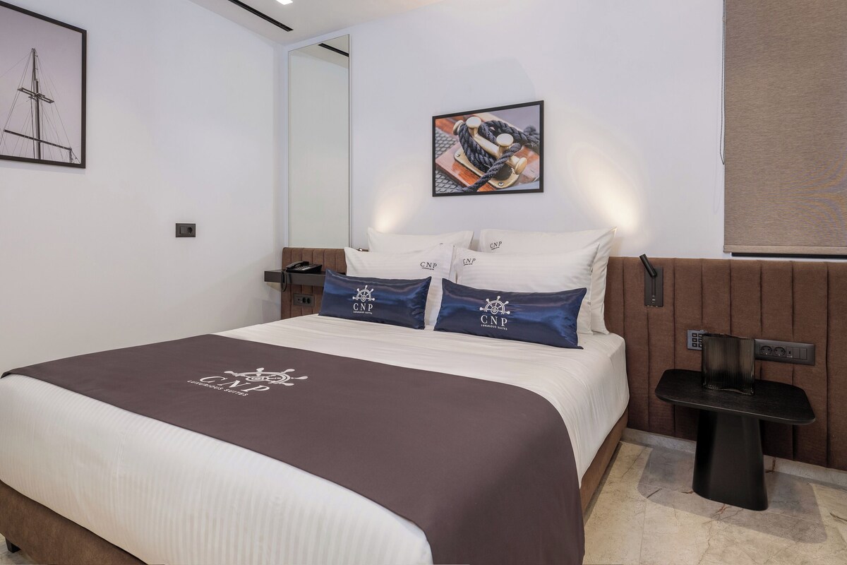 Luxe beddengoed, bedden met traagschuimmatras, een minibar
