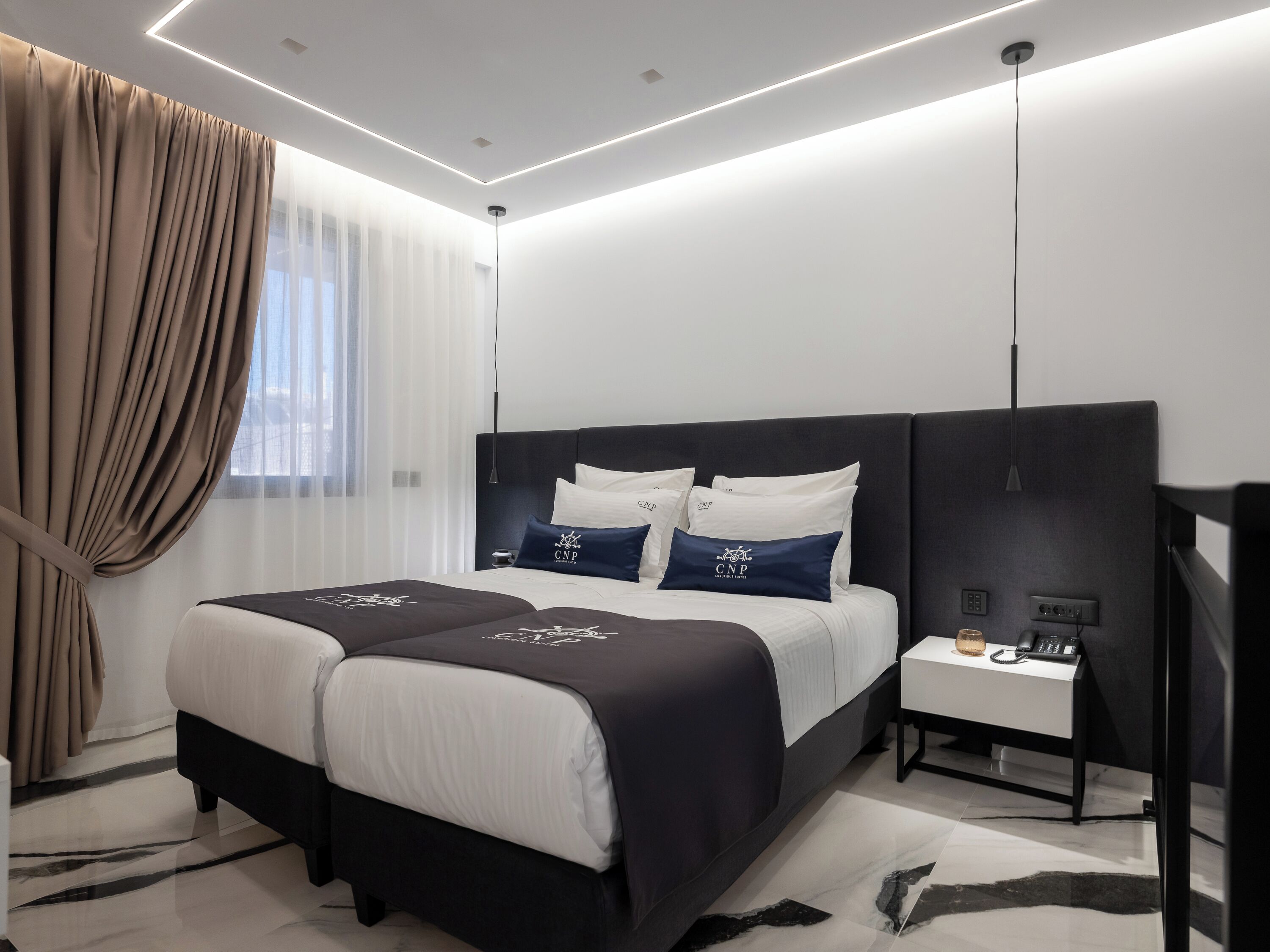 Premium bedding, memory-foam beds, minibar, in-room safe