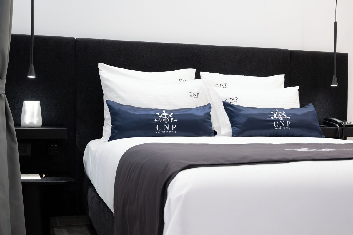 Luxe beddengoed, bedden met traagschuimmatras, een minibar