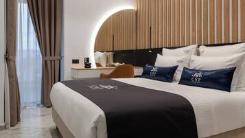 Focus | Premium bedding, memory-foam beds, minibar, in-room safe