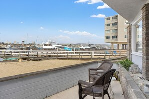 Terrace/patio - Waterfront Views, Shared Dock, & Short Walk to Beach, Shops & Surf | Edgewater B (Newport Beach)