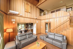 Panoramic Villa, 4 Bedrooms, Mountain View | Living area | 65-inch Smart TV with digital channels, DVD player, table tennis