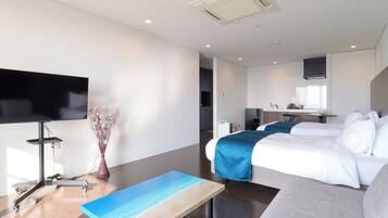 可動式ベッド (無料)、WiFi (無料)、ベッドシーツ