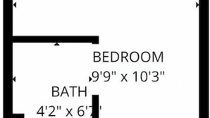 Distribución de un dormitorio y baño, con dimensiones de 2.97 x 3.12 metros para el dormitorio y 1.27 x 1.88 metros para el baño.