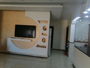 Maison Deluxe, vue sur la montagne | Aire de séjour | Téléviseur à écran plat, lecteur de DVD