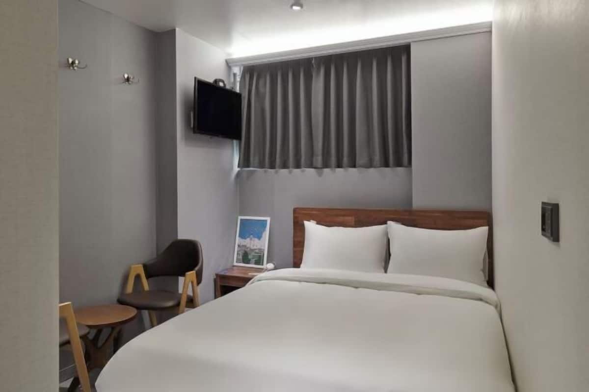 Desk, blackout curtains, iron/ironing board, free WiFi