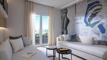 Executive Suite | Living area | 28-inch flat-screen TV with cable channels