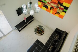Apartment, 4 Bedrooms, Balcony, Garden View | Living room
