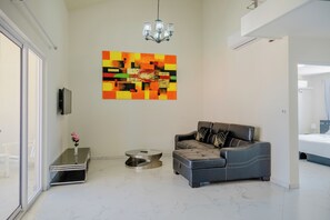 Appartement, 4 chambres, balcon, vue jardin | Salle de séjour