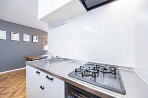 Deluxe House, Balcony | Private kitchen