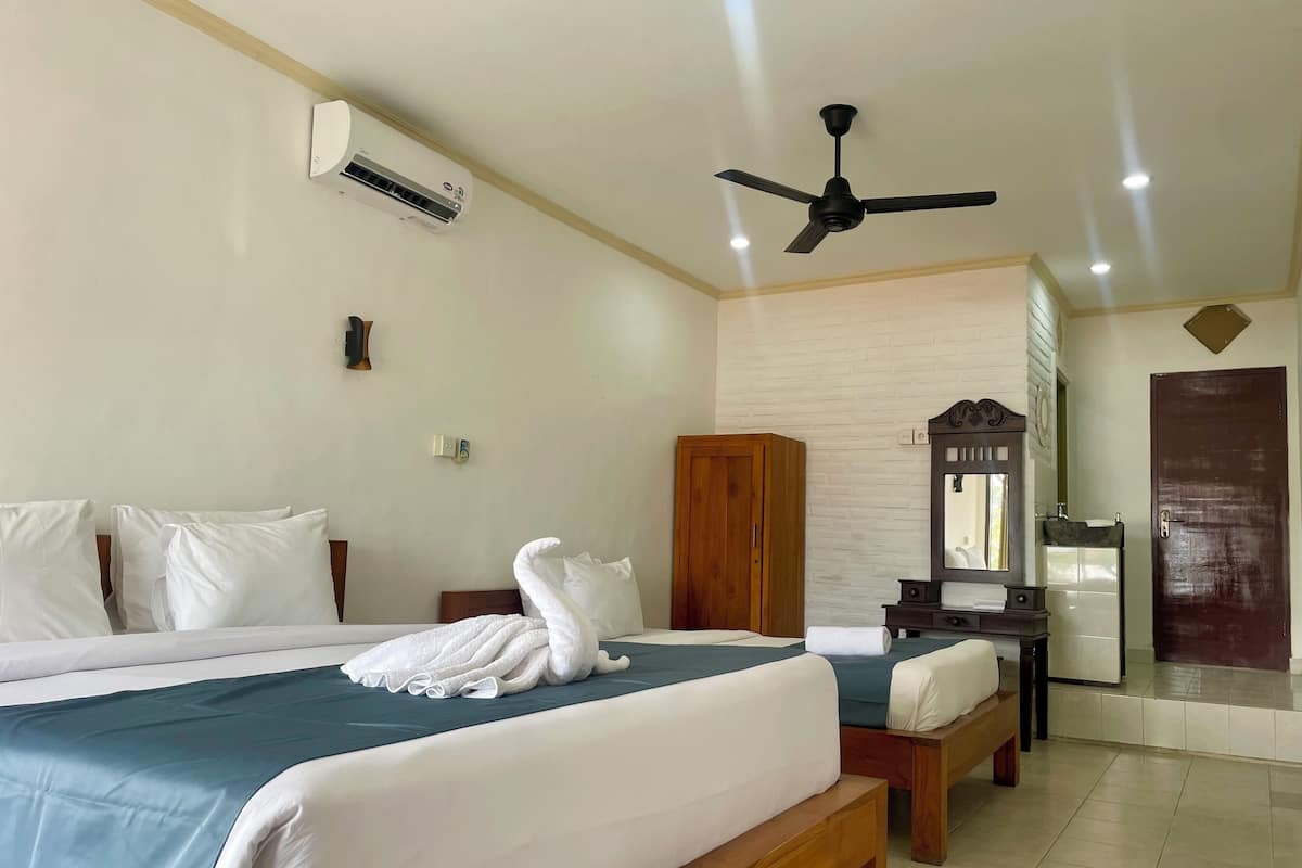 Habitación triple Deluxe, balcón | Wifi gratis