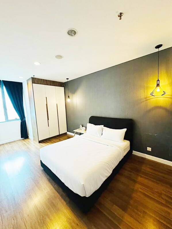 Down duvets, pillow-top beds, desk, laptop workspace