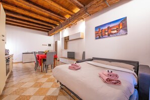 Appartement Deluxe, patio | Coin séjour