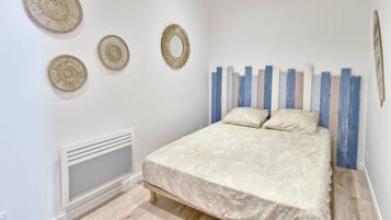 1 quarto, Wi-Fi de cortesia, roupa de cama