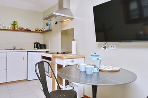 Fridge, microwave, toaster, cookware/dishes/utensils