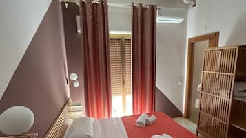 Desk, laptop workspace, blackout curtains, soundproofing