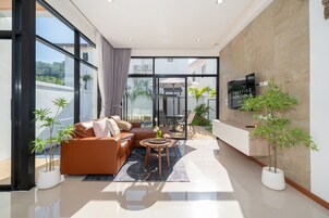 Deluxe Villa, 3 Bedrooms, Private Pool | Living area | 43-inch LCD TV with digital channels