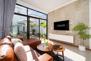 Deluxe Villa, 3 Bedrooms, Private Pool | Living area | 43-inch LCD TV with digital channels