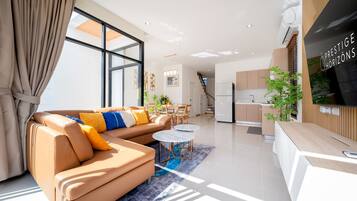 Deluxe Villa, 3 Bedrooms, Private Pool | Living area | 43-inch LCD TV with digital channels